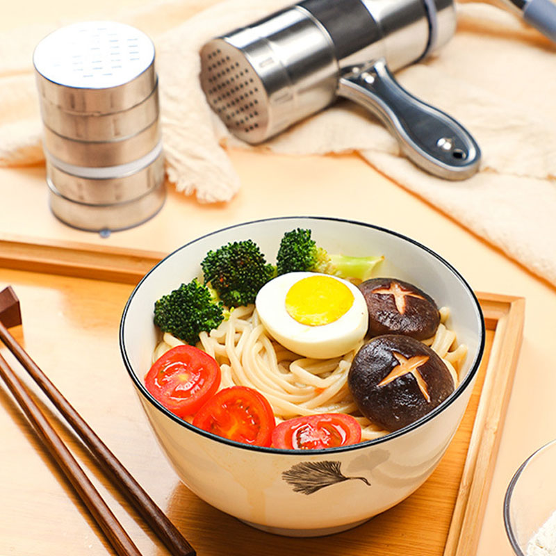 Máquina de pasta manual pequeña de acero inoxidable para uso doméstico